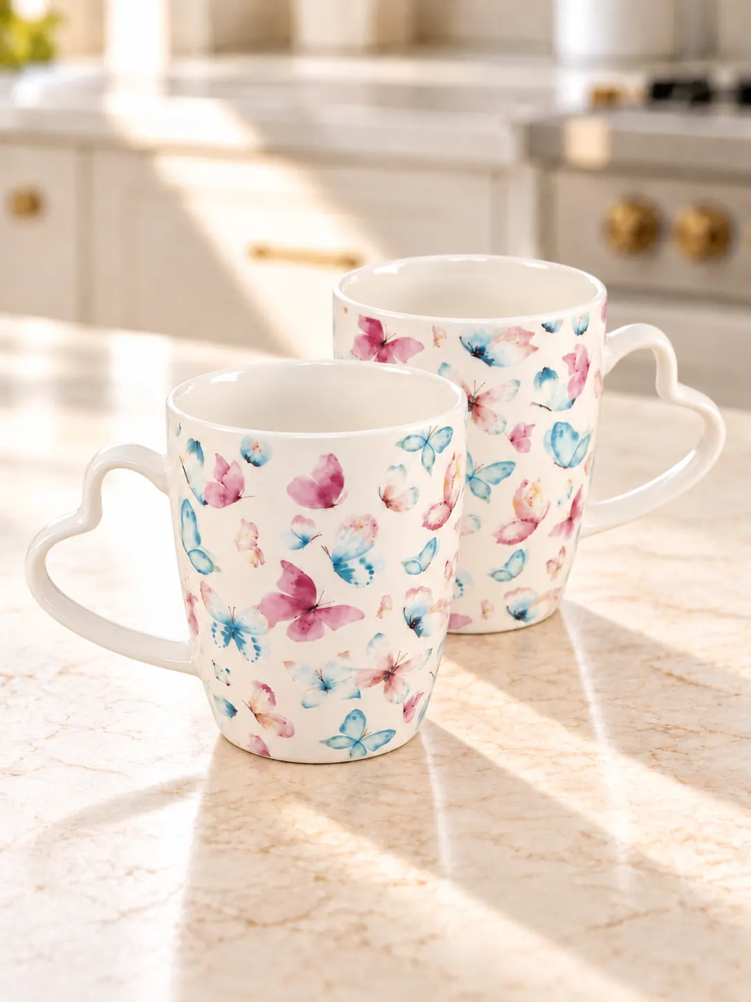 Dúo de tazas Mariposas con asas de corazón